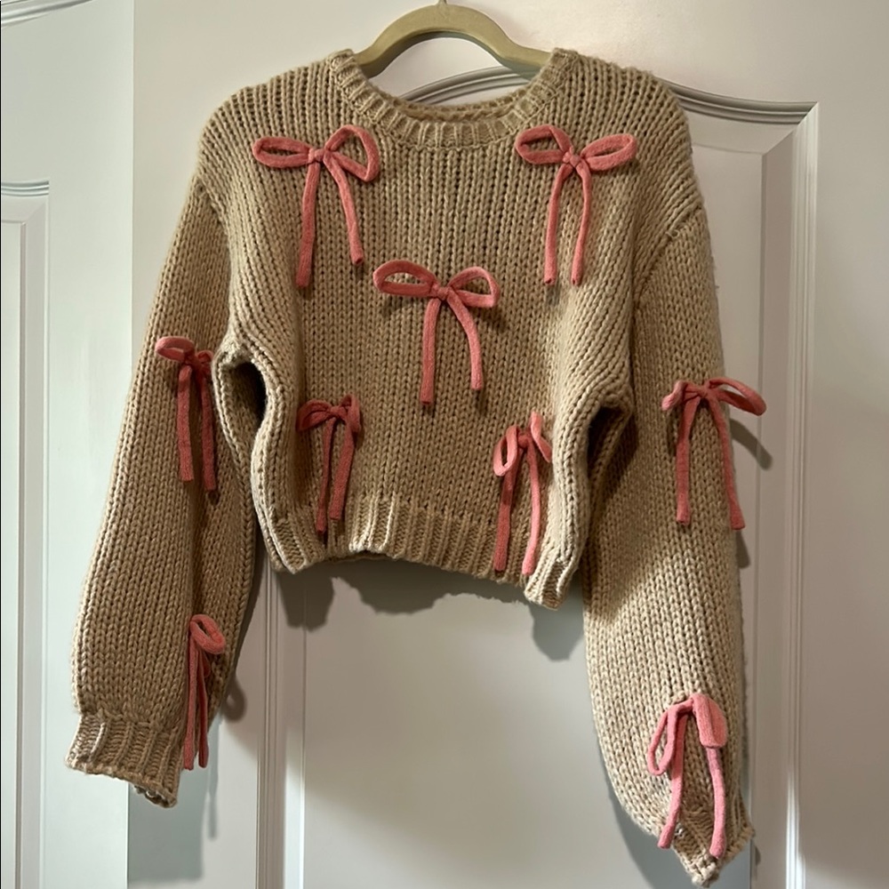 Chic Beige Sweater with Pink Accents